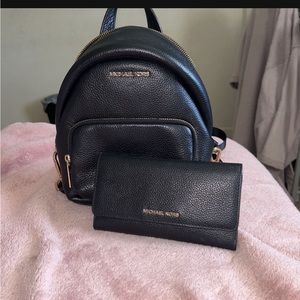 MK backpack with matching wallet, basically new only used like 2x